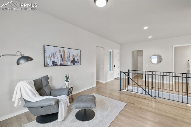 sitting room with light wood-type flooring