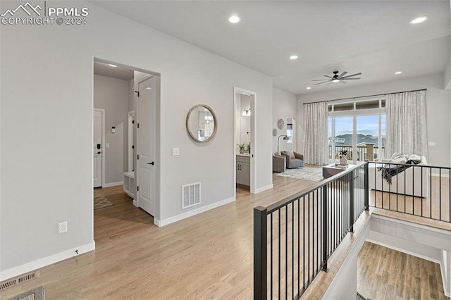 hallway featuring light hardwood / wood-style floors