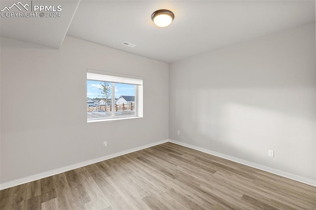 empty room featuring light hardwood / wood-style flooring