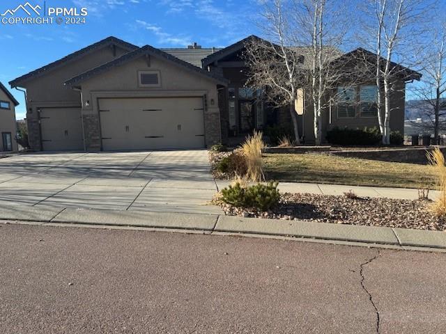 view of front of property with a garage