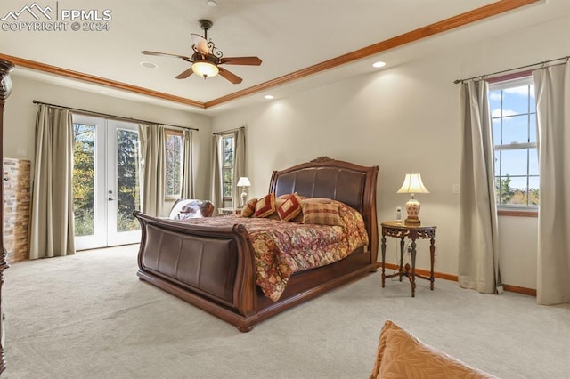 bedroom with carpet floors, access to outside, and multiple windows