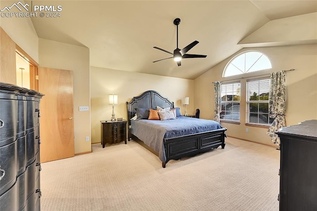 carpeted bedroom featuring lofted ceiling and ceiling fan