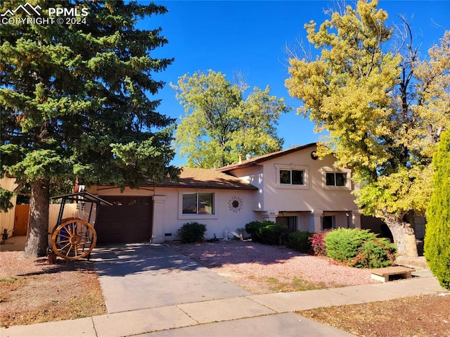 view of front of home with a garage