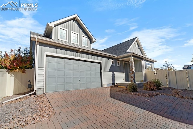 view of front of home with a garage