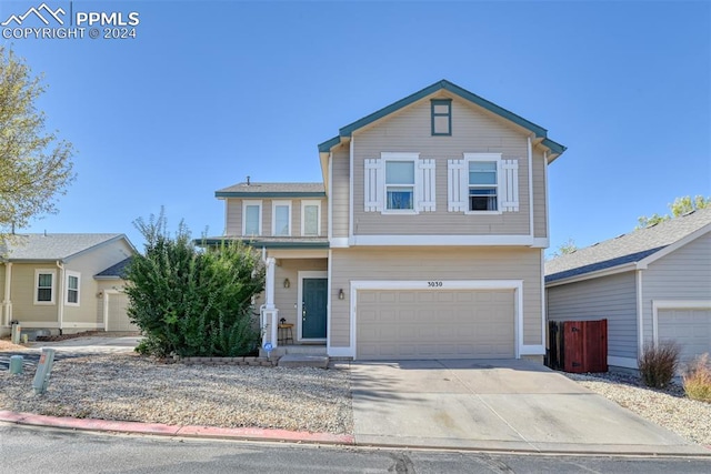 front of property featuring a garage