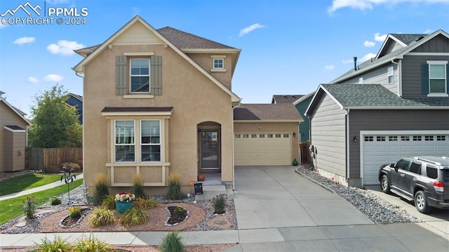 front of property featuring a garage