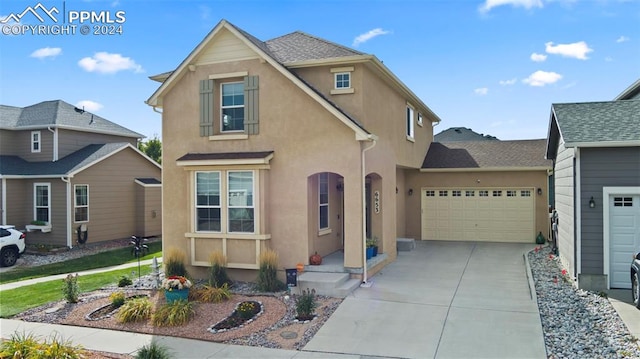 front of property featuring a garage