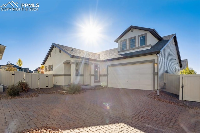 view of front of home with a garage