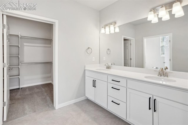 bathroom featuring vanity and tile patterned floors