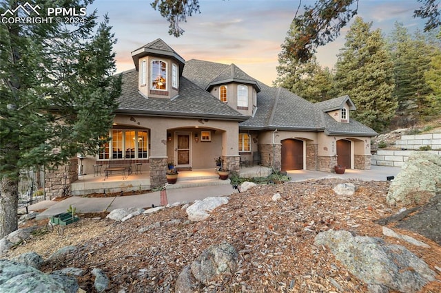 view of french country style house