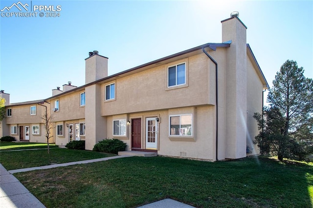 view of front of property with a front yard