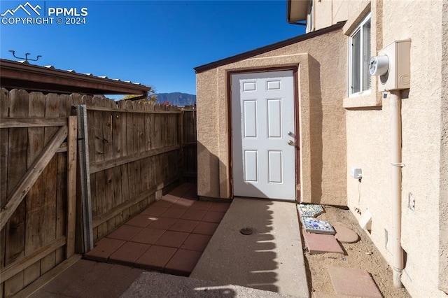 doorway to property with a mountain view