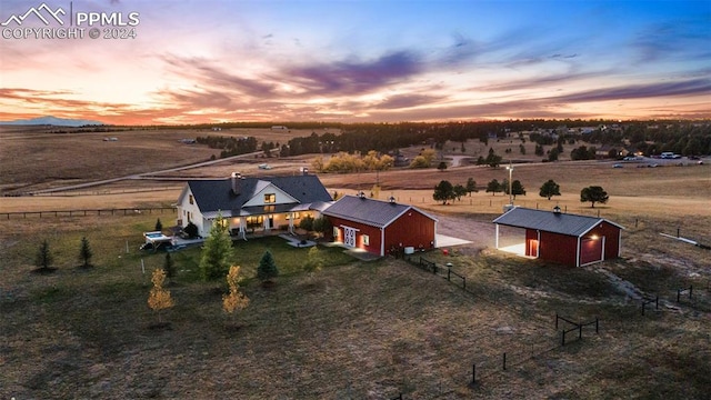 aerial view at dusk with a rural view