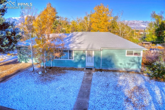 view of front of home with a mountain view