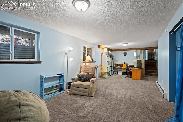 interior space with carpet floors, baseboard heating, and a textured ceiling