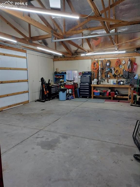 garage with a workshop area