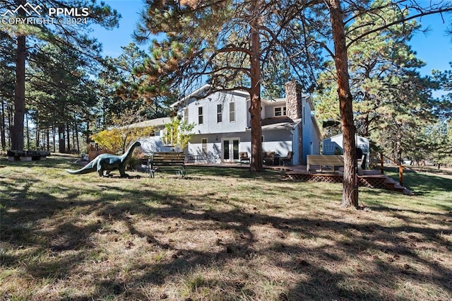 exterior space featuring a wooden deck