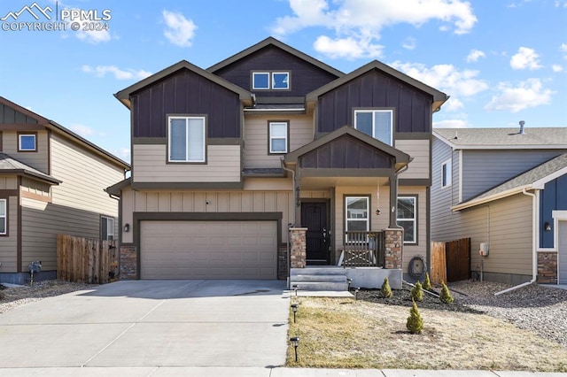 craftsman inspired home with a garage