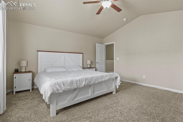 carpeted bedroom featuring vaulted ceiling and ceiling fan