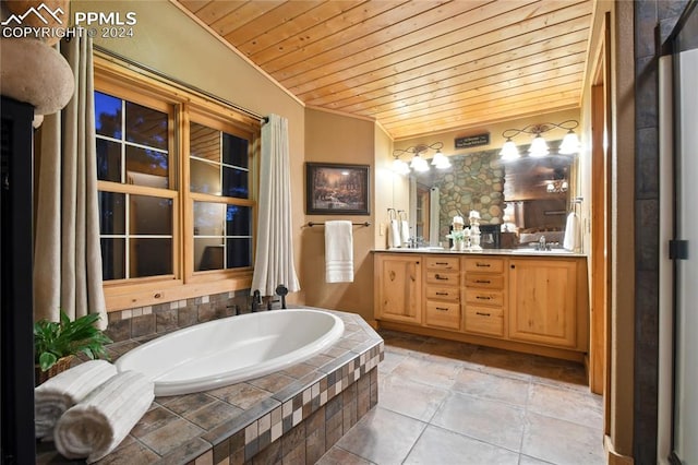 bathroom with vanity, wood ceiling, tile patterned flooring, and a relaxing tiled tub