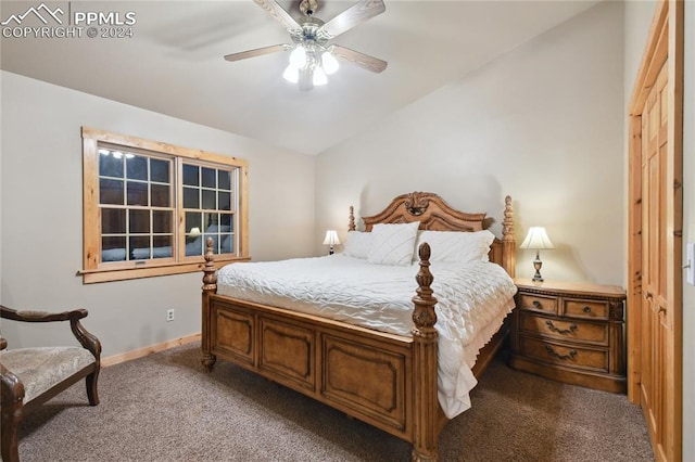 bedroom with ceiling fan, a closet, lofted ceiling, and carpet