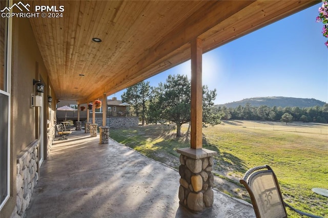 view of patio with a mountain view