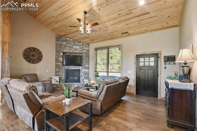 living room featuring a stone fireplace, high vaulted ceiling, wooden ceiling, ceiling fan, and light hardwood / wood-style flooring