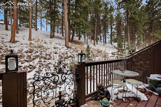 view of snow covered deck