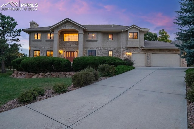 view of front of property featuring a garage