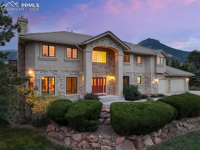 view of front facade featuring a mountain view