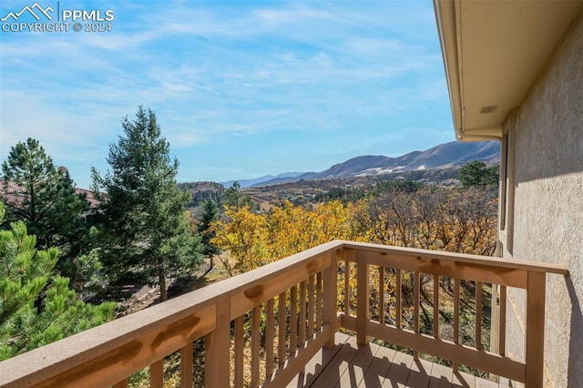 balcony featuring a mountain view