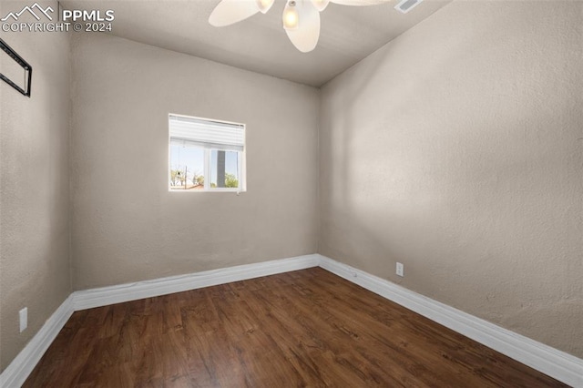 spare room featuring ceiling fan and hardwood / wood-style flooring