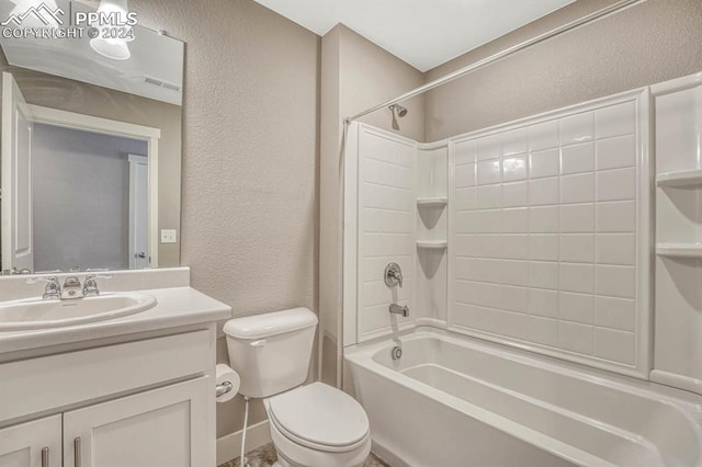 full bathroom with washtub / shower combination, vanity, and toilet