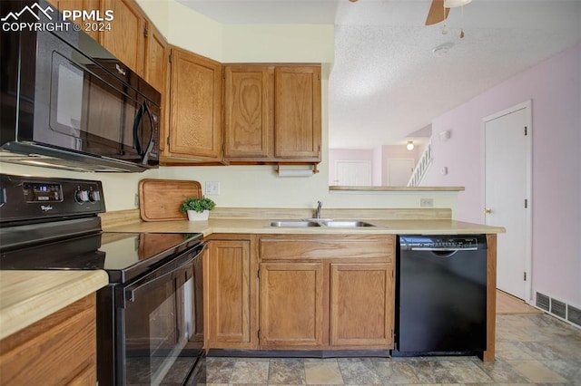 kitchen with sink, black appliances, and ceiling fan