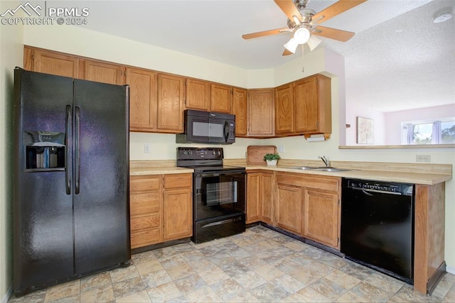 kitchen featuring sink, black appliances, a textured ceiling, and ceiling fan