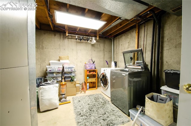 washroom featuring separate washer and dryer