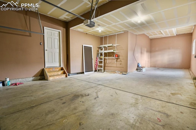 garage featuring a garage door opener