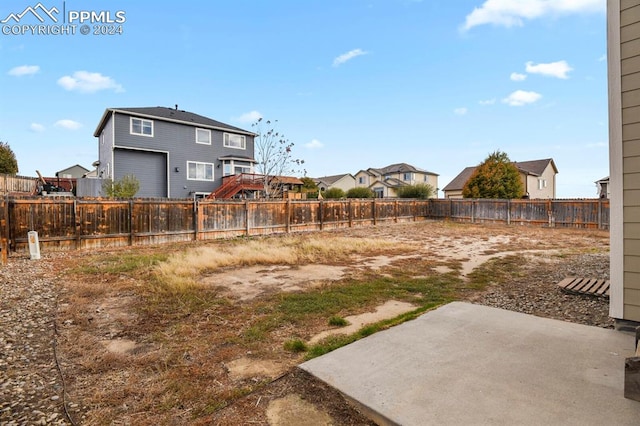 view of yard with a patio area