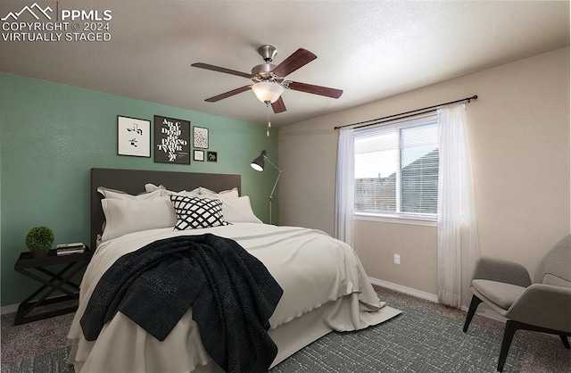 carpeted bedroom with ceiling fan