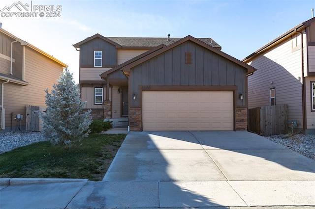 view of front of property with a garage