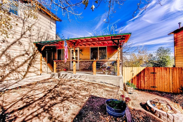 back of house featuring a patio