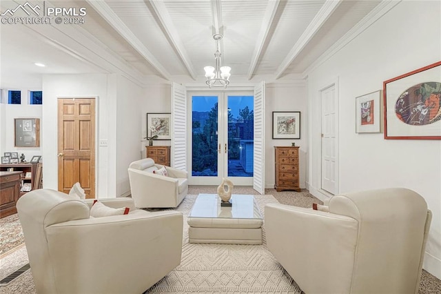 carpeted living room featuring beamed ceiling, an inviting chandelier, ornamental molding, and french doors