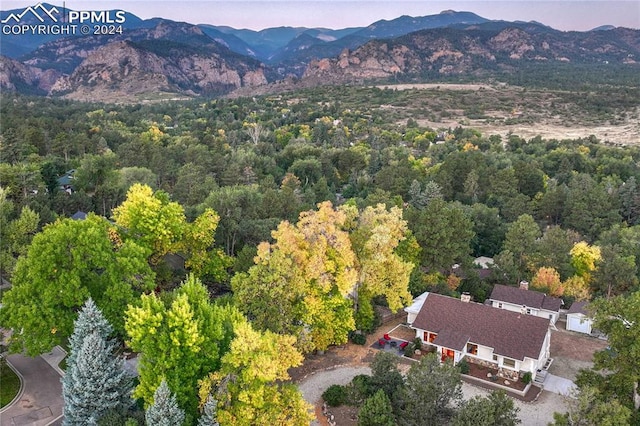 aerial view at dusk with a mountain view