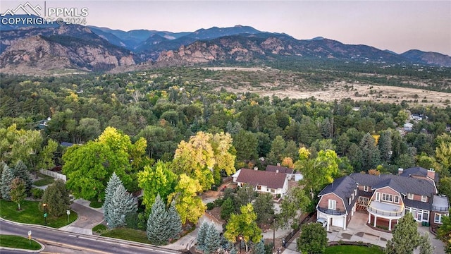 aerial view at dusk with a mountain view