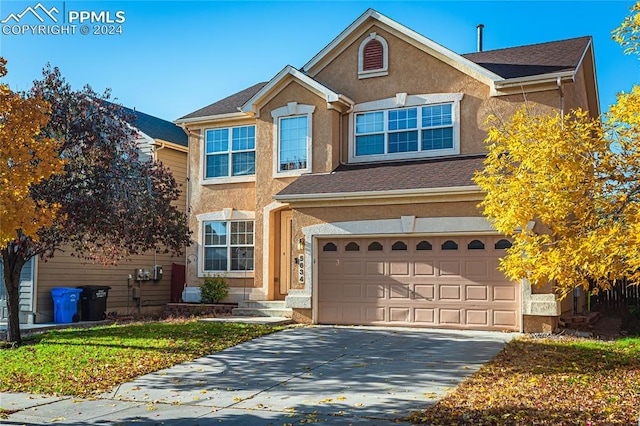 view of front of house with a garage