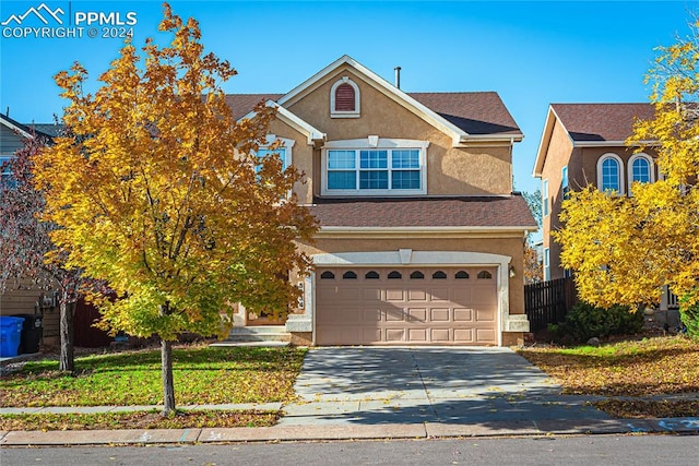 view of front of house with a garage