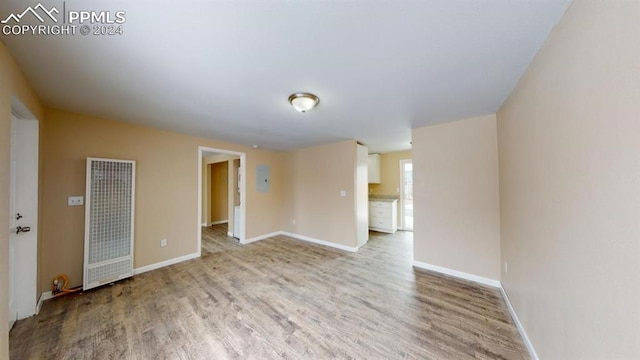 empty room with wood-type flooring