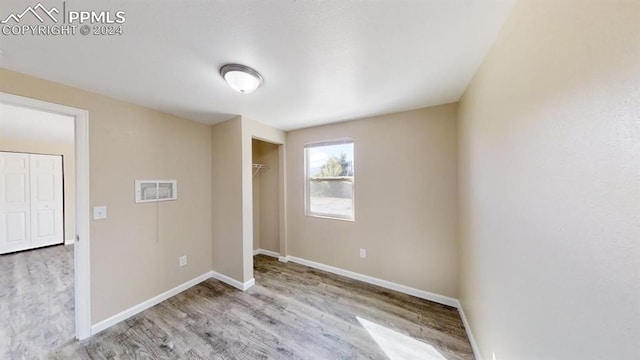 empty room featuring light hardwood / wood-style floors