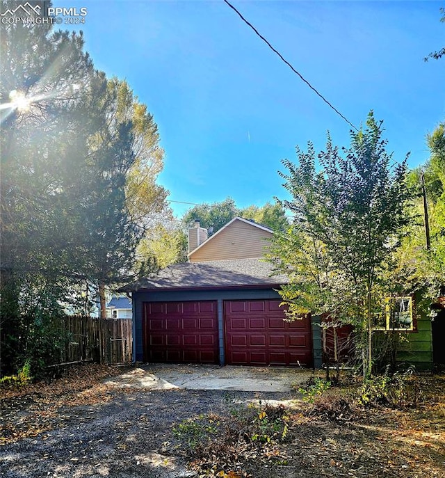 view of home's exterior with a garage