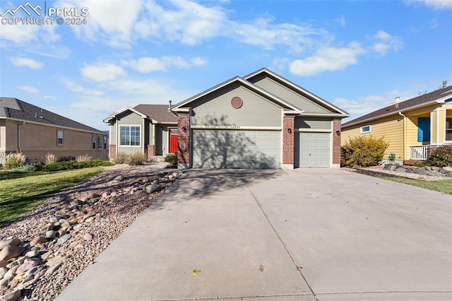 ranch-style house featuring a garage